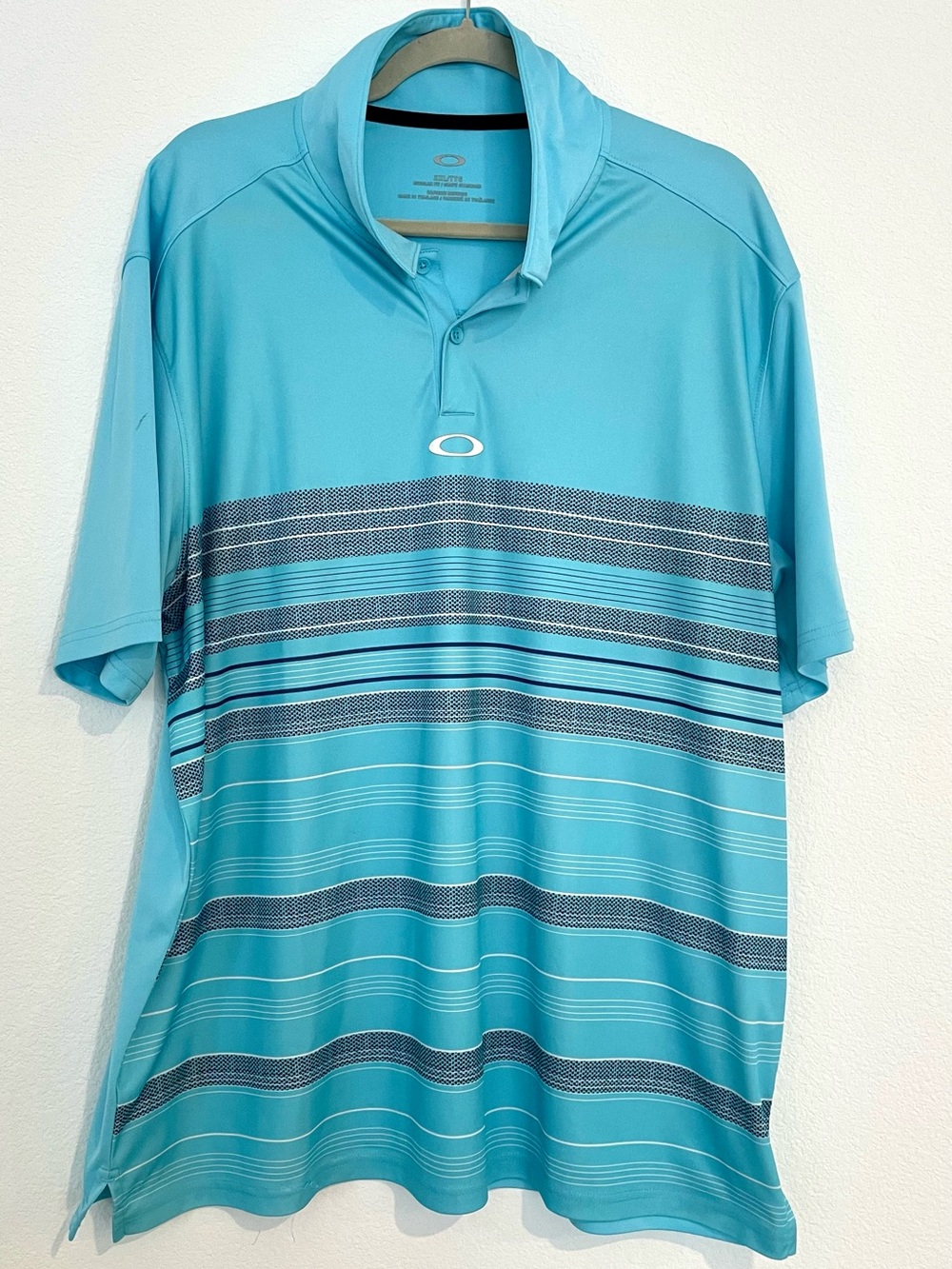 Oakley Men’s Aqua Blue Striped Performance Polo